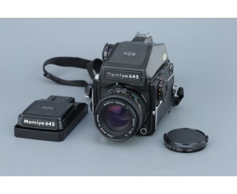 A Mamiya M645 1000S Medium Format Camera, with Mamiya-Sekor C N f/2.8 80mm lens, body, VG, shutter not tested, lens, VG, some