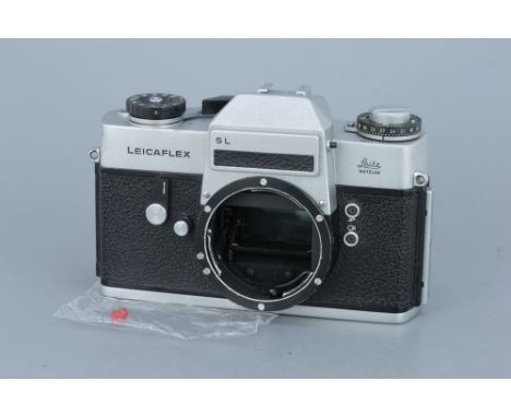 A Leitz Leicaflex SL Camera, chrome, body, G, shutter working, lens release tab broken,