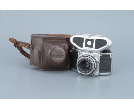 A Metz Mecaflex SLR Camera, chrome, serial no. 1318, with Heinz Kilfitt Kilar C f/3.5 40mm lens, serial no. 222-2993, body, G