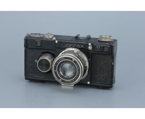 A Zeiss Ikon Contax Ib Rangefinder Camera, black, with Carl Zeiss Jena Tessar f/2.8 50mm lens, body, F, shutter working, lens