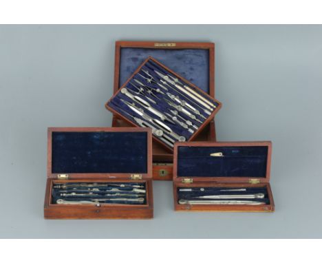 Three Sets of Drawing Instruments Three Sets of Drawing Instruments, in mahogany cases, one by Stanley with broad arrow marks