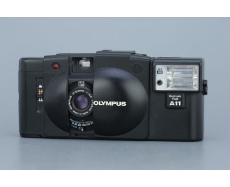 An Olympus XA 2 35mm Compact Camera, black, untested, with A11 flash, untested, body, untested, in makers hard case,