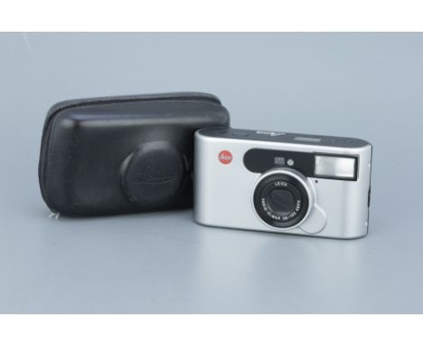 A Leica C1 35mm Compact Camera, silver, with a Vario-Elmar 38-105mm lens, body, G-VG, untested, lens, G, with makers case,