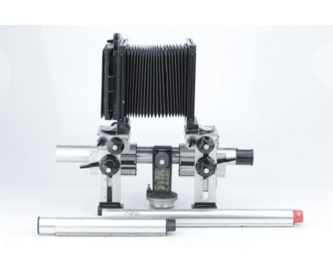 A Sinar P 5x4" Monorail Large Format Camera, with lens board and extension rails