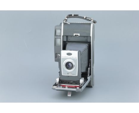 A Polaroid Land Camera 900 Electric Eye Medium Format Camera, grey, body, G-VG, shutter untested, lens, G, slight haze