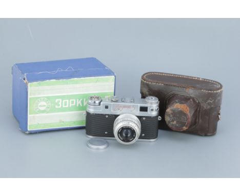 An Early Zorki 5 Red Logo Rangefinder Camera, chrome, with an Industar-50 rigid body f/3.5 50mm lens, body, G, shutter workin