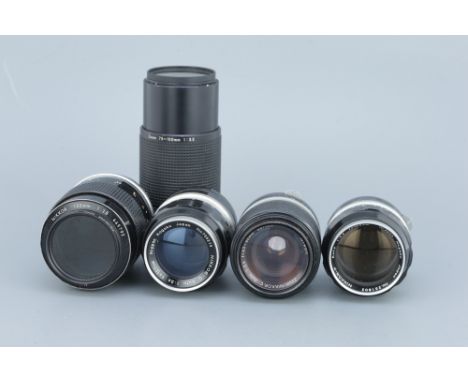 Five Nikon Nikkor Lenses, incluing a Nikkor-P Auto f/2.5 105mm lens, a Nikkor f/2.8 135mm, a Zoom-Nikkor C f/3.5 43-86mm lens