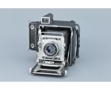 A Graflex Graphic Press Camera, black, with a Graflex Optar f/4.5 101mm lens, body, G-VG, focal plane shutter working, 6x9 ba