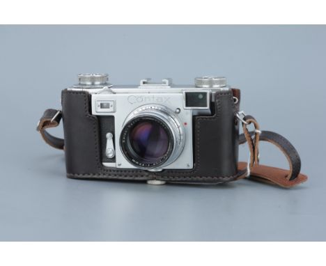 A Contax IIa Rangefinder Camera, chrome, serial no. A43260, with Zeiss-Opton Sonar f/1.5 50mm lens, body, G-VG, shutter worki