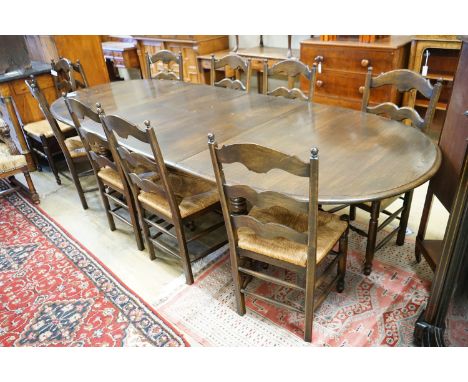 A French style oak extending dining table, with two spares leaves, 280cm extended, width 11cm, height 74cm together with a se