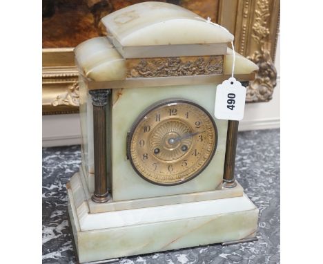 An early 20th century green onyx and brass mounted mantle clock-31.5 cms high.