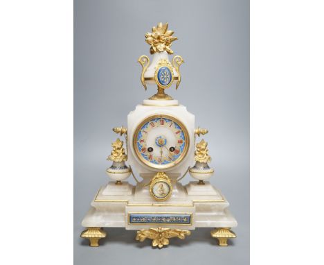 A late 19th century French alabaster and ormolu mounted mantel clock with key and pendulum - 39cm tall