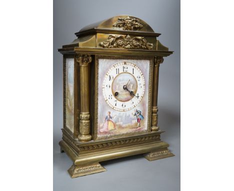 A French porcelain mounted brass mantel clock-31 cms high.