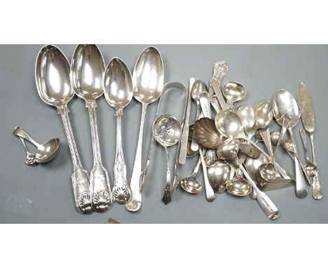 A quantity of assorted mainly 19th century and later flatware, including two Georgian caddy spoons, Victorian tablespoons, an