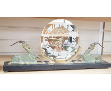 An Art Deco bronze and black slate ‘antelope’ mantel timepiece, 62cm