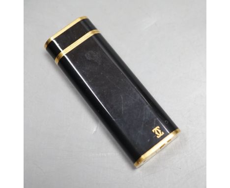 Cartier, black enamel and gold plated lighter