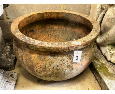 A circular terracotta garden planter, diameter 51cm height 31cm
