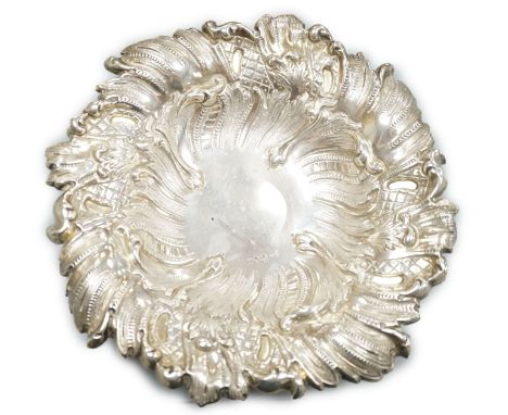A late Victorian Neo-rococo fruit compote on pedestal stem, all over spiralling rocaille and wave chasing, makers Walker and 