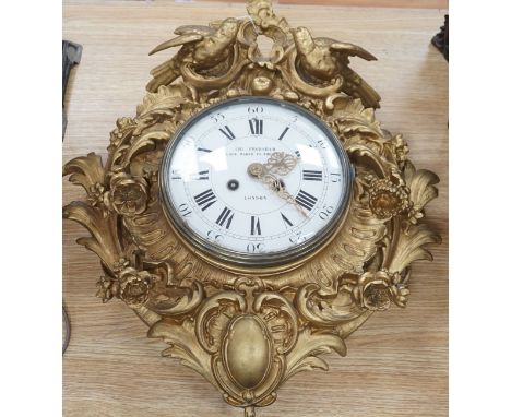 A late 19th century French giltwood and composition wall clock, retailed by Charles Frodsham, 53 cm high