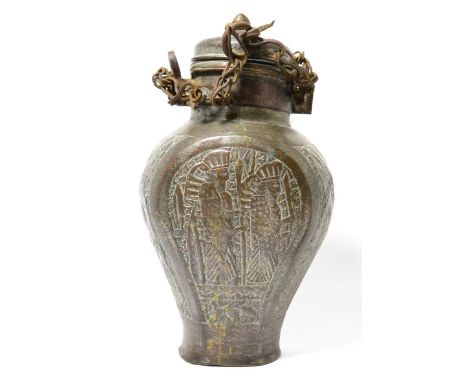 A Persian silvered copper pilgrim flask and cover, in 16th century style, decorated with stylised figures and foliage, 31cm h