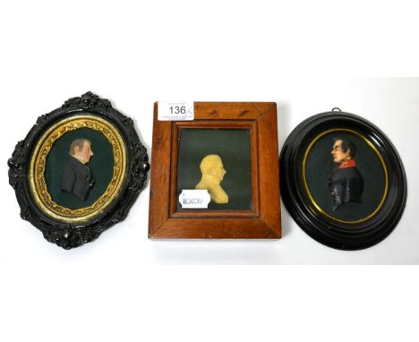 A wax silhouette portrait of an officer, 9cm, in an ebonised frame; and two further wax portraits (3)      
