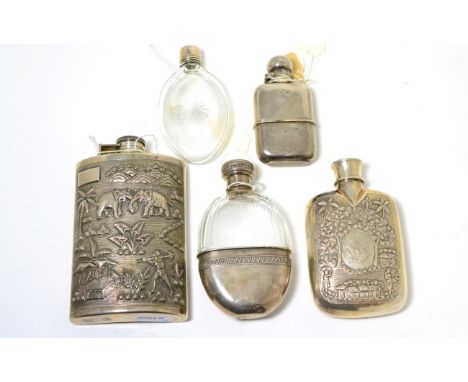A collection of silver and white metal hip flasks, comprising, an Indian example stamped Sterling; A similar unmarked example