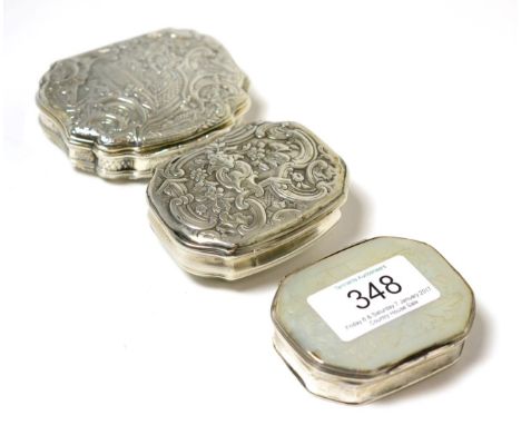 A white metal and mother-of-pearl snuff box and two Continental white metal snuff boxes (3)      