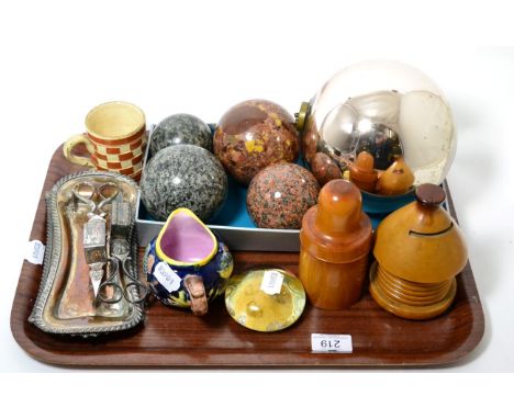 A Witch's ball, three granite carpet bowls, a marble carpet bowl, two old Sheffield plate snuffers trays and snuffers, a tree