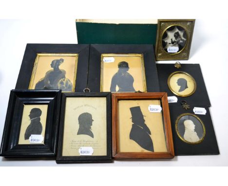 Seven assorted 19th century portrait silhouettes in period frames; and a reverse painted portrait of a lady (8)      