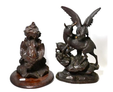 A Black Forest carved wall bracket, 34cm; and a Chamois being attacked by an Eagle, 43cm (2)      