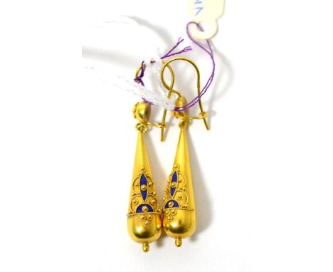 A pair of Etruscan style blue enamelled drop earrings, the cicular studs suspending torpedo shaped drops with blue enamel and