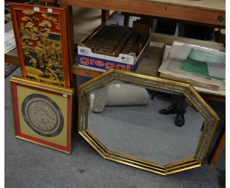 A Chinese parcel gilt red lacquered panel, a large framed Chinese needlework panel; two smaller panels; and a gilt framed mir