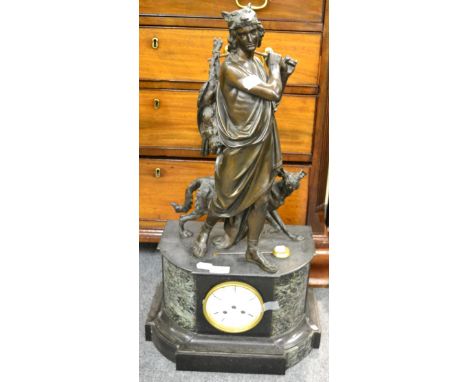 A marble and black slate figural spelter striking mantel clock, signed Hry Marc, A Paris, circa 1890, case depicting a classi