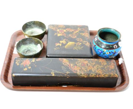 A Japanese lacquer box and cover, 19th century, decorated with foliage, 30cm wide; a similar box and cover, 36cm wide; a cloi