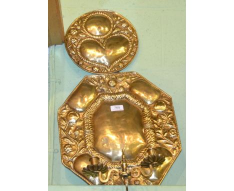 A 17th century Dutch stamped brass twin-light wall sconce with scroll branches and fruit and flower decoration, 62cm high  Pr