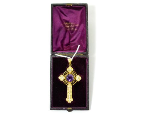 An amethyst and white enamel Celtic cross pendant, a round cut amethyst in a yellow rubbed over setting with a floral motif i