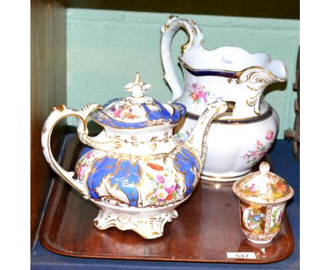 A Staffordshire porcelain jug, circa 1830, painted with flower sprays within blue and gilt line borders, 24cm high; a Coalpor