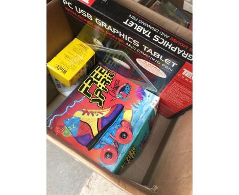 BOX WITH ROLLER SKATES, GRAPHICS PAD ETC.     T3