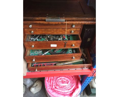 A WOODEN ENGINEERS MULTIDRAWER TOOLBOX WITH TOOLS