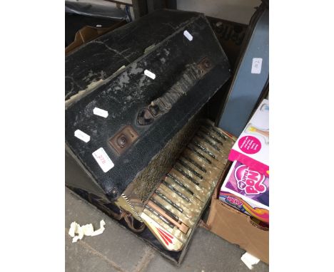 A PIETRO PIANO ACCORDION, PART CLARINET AND PORTABLE TYPEWRITER