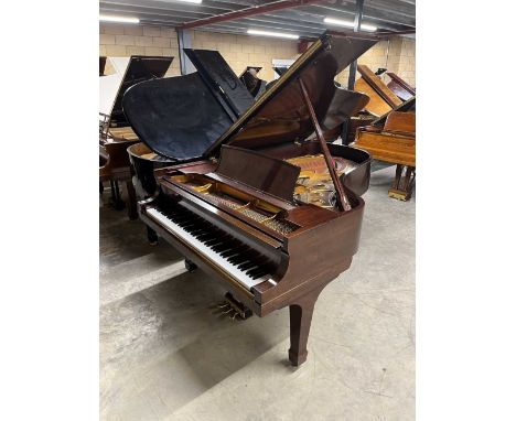 Steinway (c2006) A 6ft 11in New York Model B grand piano in a satin mahogany case on square tapered legs; together with a mat