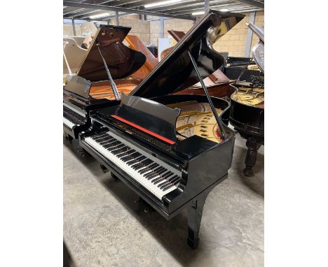 Steinway (c1928) A 5ft 7in Model M grand piano in an ebonised case on square tapered legs; together with a stool. IRN: TNR21Q