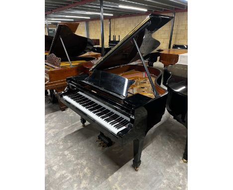 Steinway (c2006) A 6ft 2in Model A grand piano in a bright ebonised case on square tapered legs; together with a stool.A cond