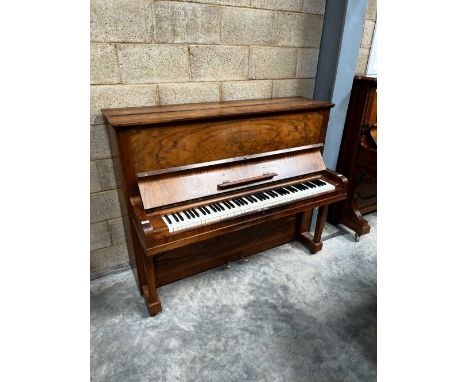 Steinway (c1936) A Model V upright piano is a figured walnut case. IRN: EECK883Z A condition report for this Lot will be avai