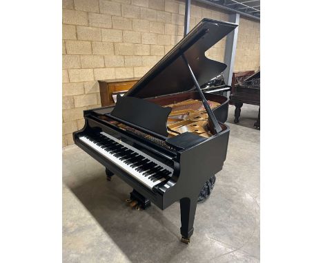 Steinway (c1981 ) A 7ft 5in Model C grand piano in a satin ebonised case on square tapered legs; together with a stool. AMEND