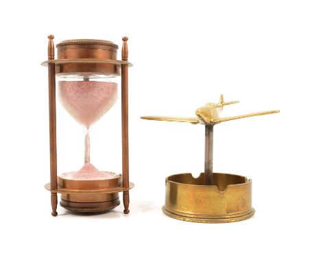 Kelvin &amp; Hughes, Brass hourglass timer/ compass, 1917, and a brass airplane desk ornament.Qty: 2