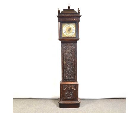 James Leigh, longcase clock, carved oak case with turned finials, cavetto cornice, turned columns, long door, plinth base 12"