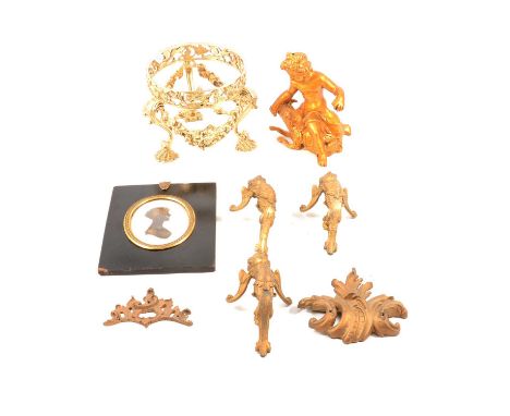 Elkington &amp; Co parcel-gilt metal stand, pierced rim raised on three scrolled supports with leaf caps, joined by fruit lad