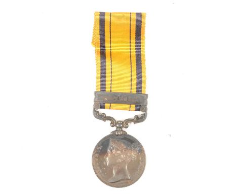 Medal; South Africa medal with one bar, 1879, awarded to 95 Private J Devlin, 88th Foot, with ribbon.