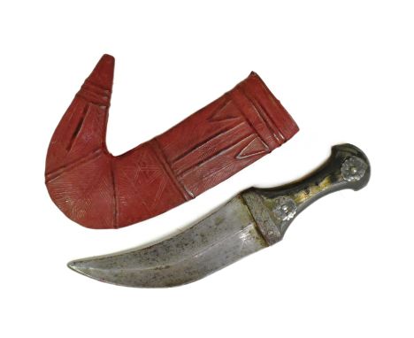An early 20th Century circa 1900 South Arabia ( Hadhramaut Yemen ) Jambiya dagger. Waisted horn hilt with white metal floral 